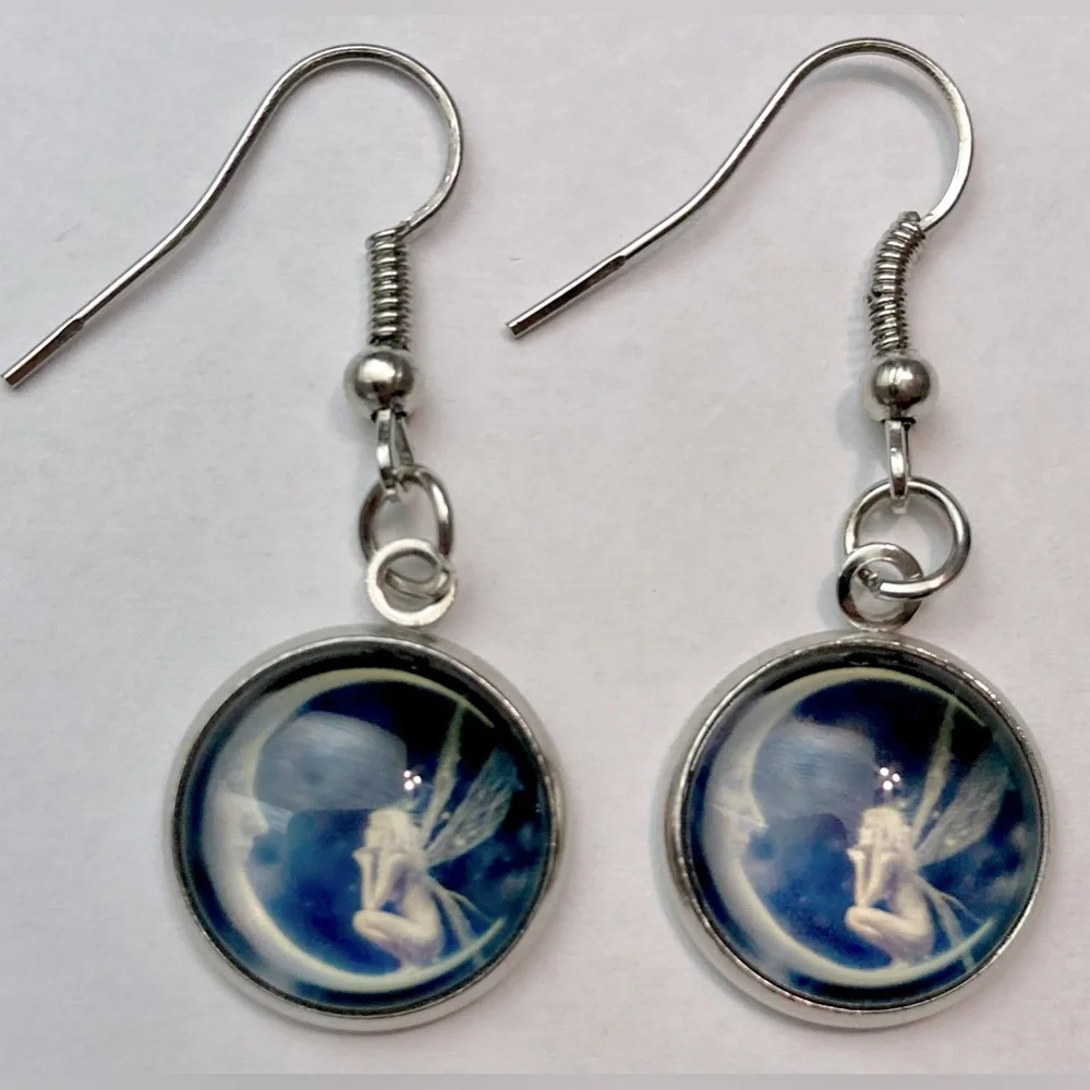 Women's pendant earrings , Earrings in the shape of the moon and angel